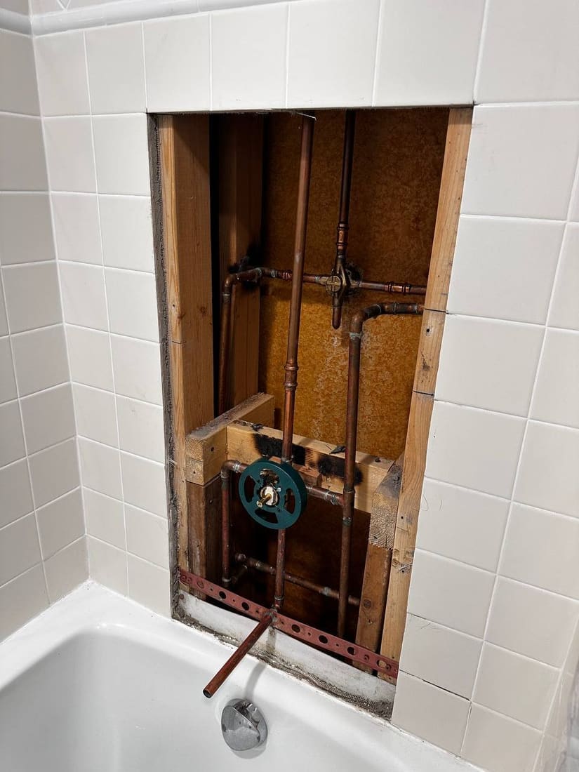 Bathroom 3 before — tub demo and prep