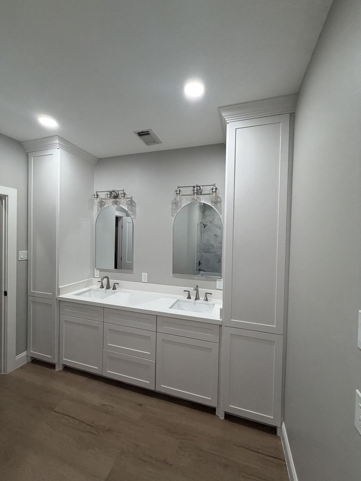 Completed bathroom remodel — vanity and wood-look tile, The Woodlands TX