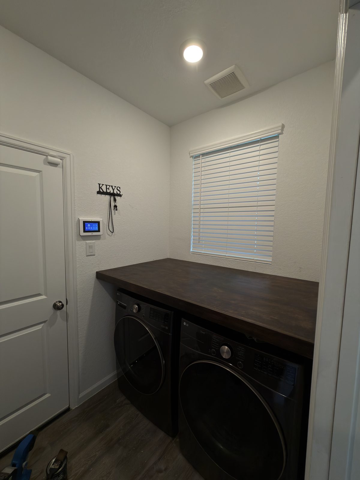 Custom laundry countertop and built-in