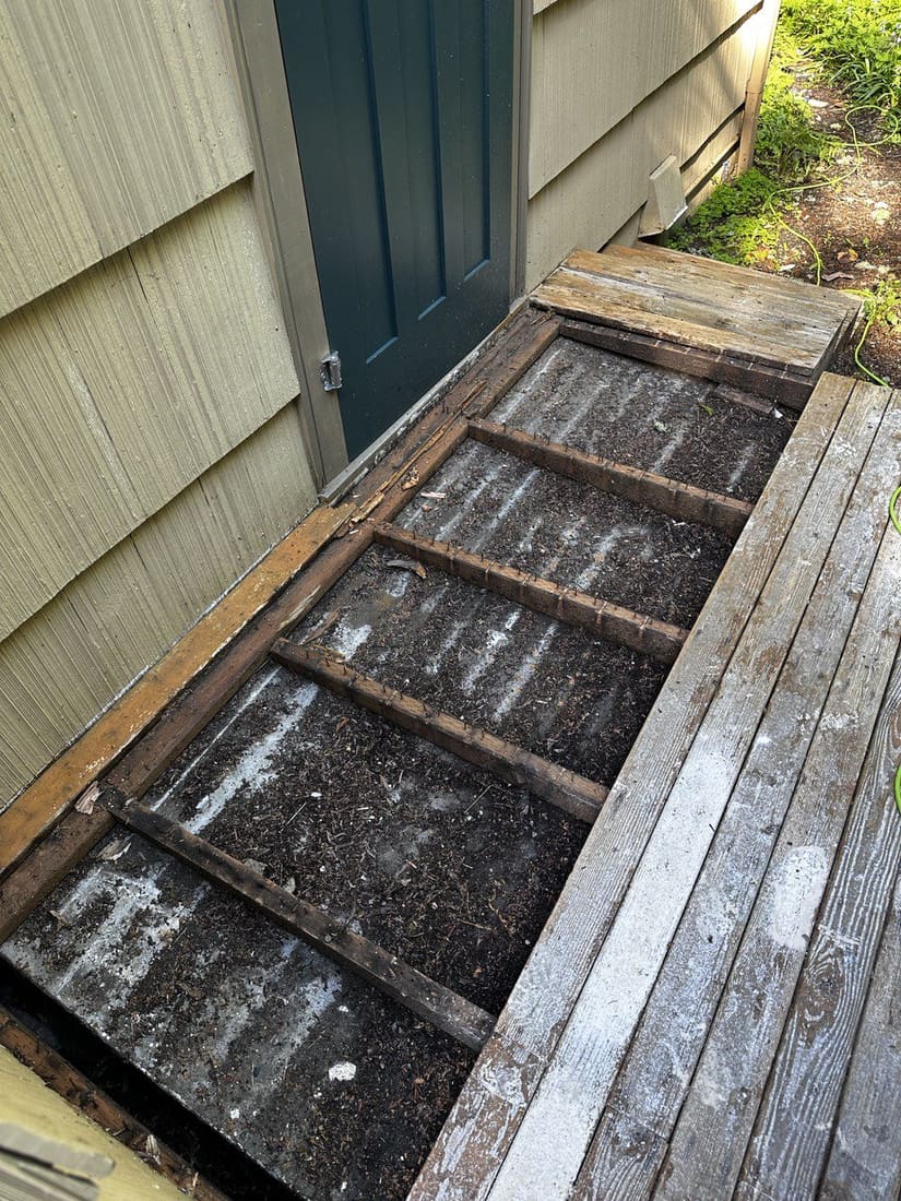 Deck #2 before — weathered boards