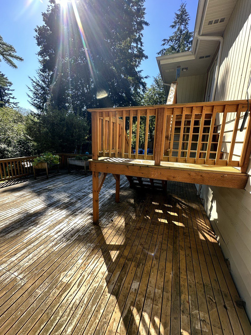 Finished residential deck with cedar railing — deck build and repair package The Woodlands TX