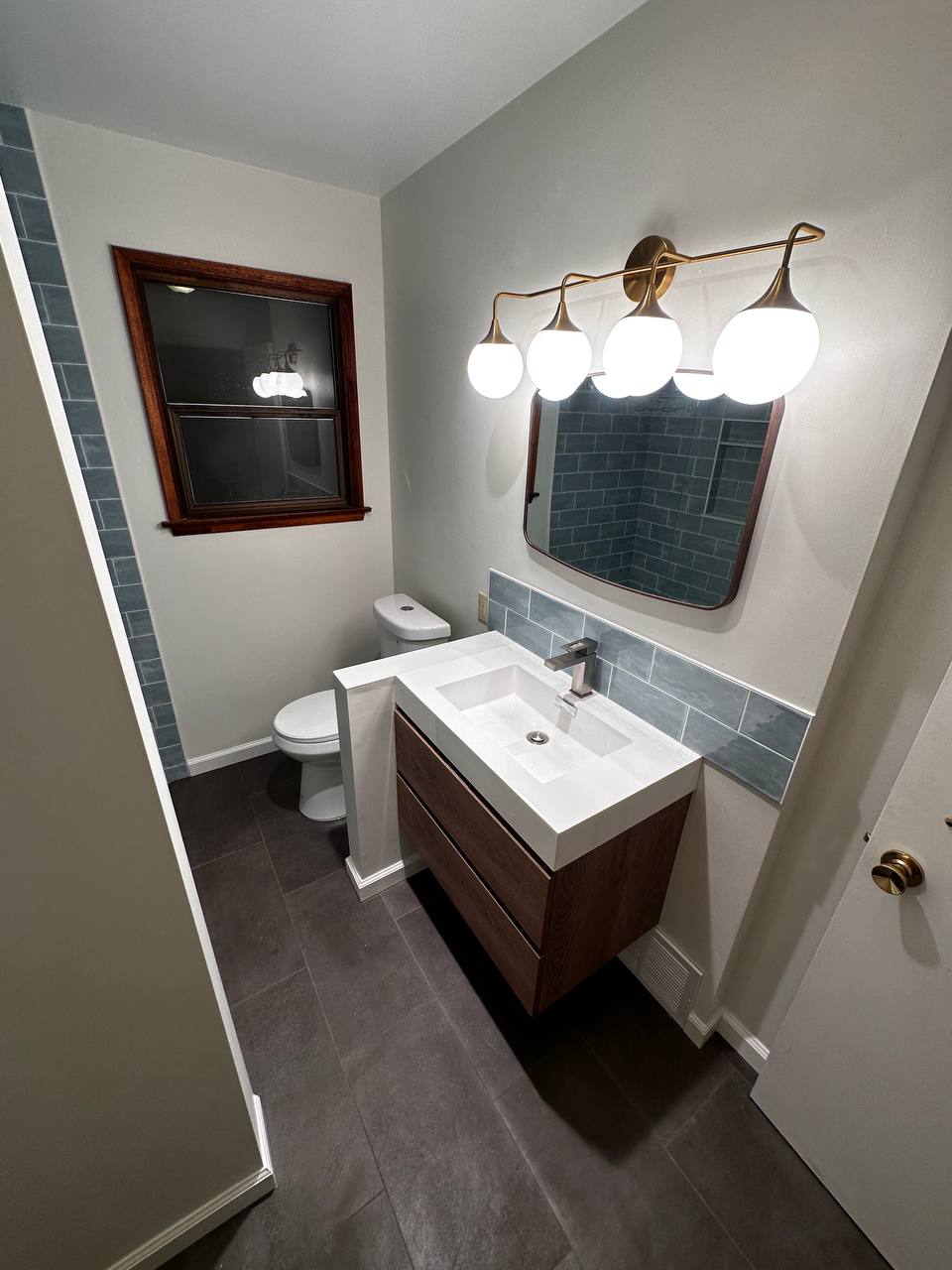 Blue subway tile bathroom remodel in Spring TX